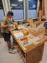 Volunteer, Michael, prepping Sunset Craft Kits