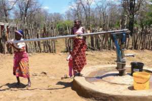 Women Pumping Water