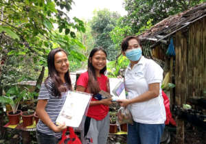 Sarah distributing tablets around Cebu Island