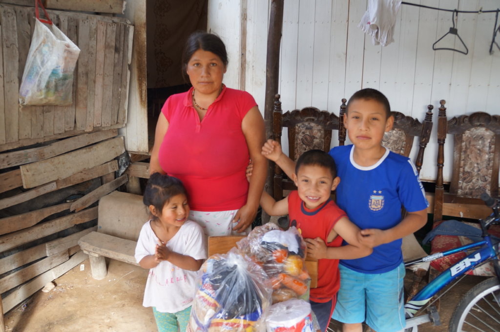 Happy Families Receiving Food Aid