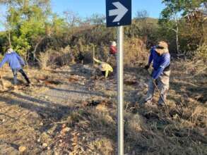 PDC team preparing the soil for tree planting