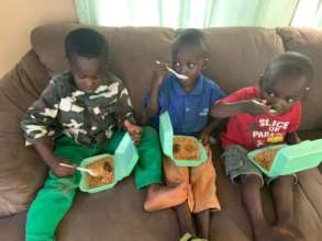 Children with their food packs