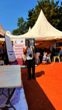 Joy for children staff addressing the people