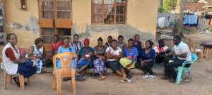 women savings group during a support session