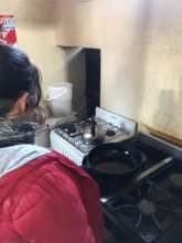 Girls helping in the kitchen