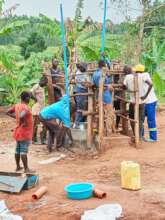 Workers Refurbishing Well, Busenya Village