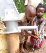 Kids at refurbished well