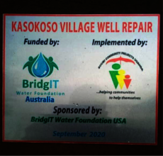 Plaque on completed refurb well, Kasokoso Village