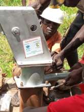 Workers at Kyajja Village Well