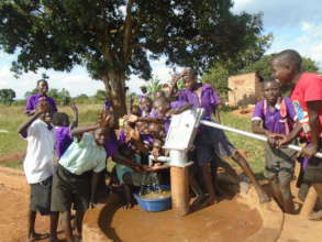 Boys Celebrating Water Well