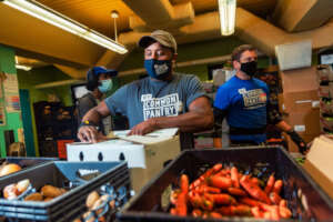 NYCP staff taking delivery of fresh healthy food