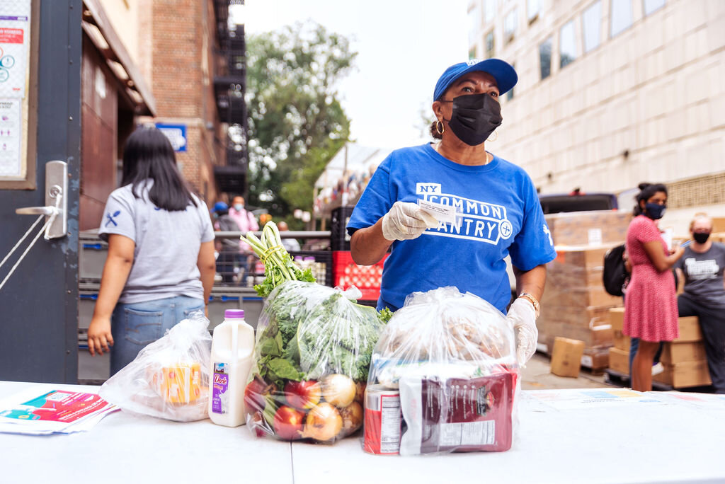 NYCP Volunteer distributing Pantry packages