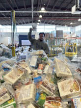 Thanksgiving bags being prepped at our Food Hub