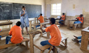 A headteacher in a class with no girls in Kenya