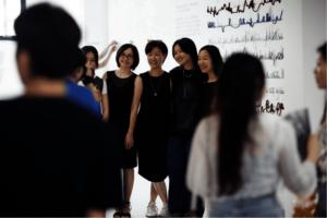 Coco (second from right) at her exhibition