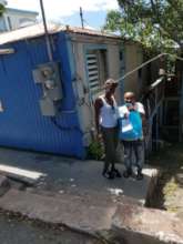 Volunteer distributing groceries during COVID-19