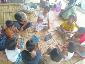 Reading circle in IDP camp