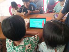 Reading circle at monastery school