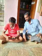 Mohan is using a tablet for his daily studies