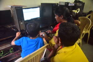 Teacher and Students at Digital Learning Centre