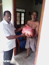 Our Country Manager Percy donating parcels