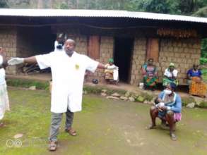Care worker educates women on social distancing