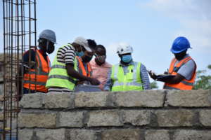 The Construction Leadership Team Reviews Work