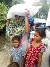 Flour bag receive by single mother for children