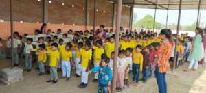 Morning Assembly at school with singing & prayers