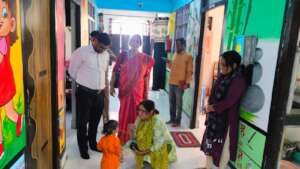 Staff and child at the children's home