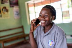 A Mentor Mother talking to a client by phone