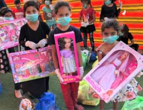 3 girls get dolls as a special treat during COVID