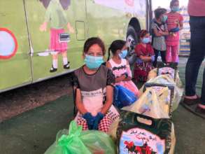 Kids at Hope Bus 2 get food, hygiene packages