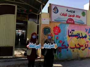 Clean your hands, wear a mask - at a girls school