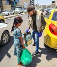 Girl who washes windshields gets food, hygiene