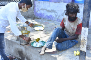 Differently abled elderly getting food donation