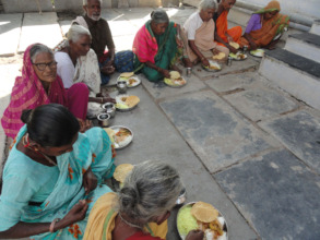 Poor Old age people having food under feed hungry