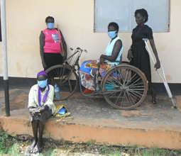 Mama Cave and her team of mask-makers in Gulu
