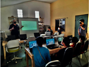 Our Thai trainer, standing on the right, is great!