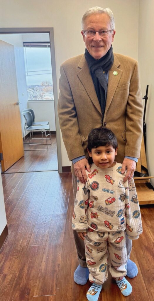 Douglas with Child on the Advance Doman Program