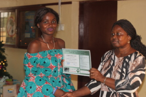 Mariama Receiving her Training Certificate