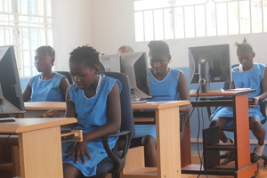 girls learning in computer lab