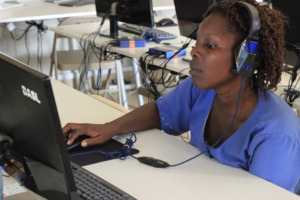 Mrs Conteh receiving training at our computer lab