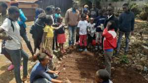 Children learning to farm