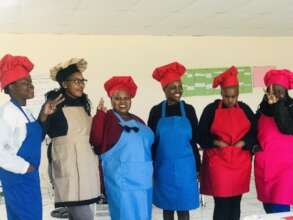 SHEROES participants wearing aprons made by them