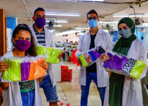 Anera's vocational training students sew masks