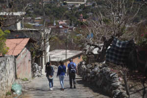 Atzin team works throughout the village