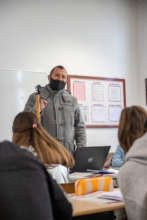 Mr. Canellari teaching with his new laptop