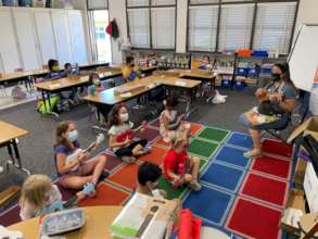 Students enjoying music in a GITC classroom