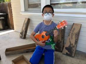 Student receives his uke for online learning!